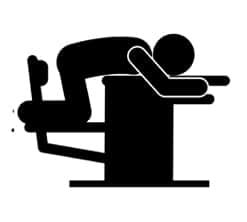 Icon image of man lying on the table from chair